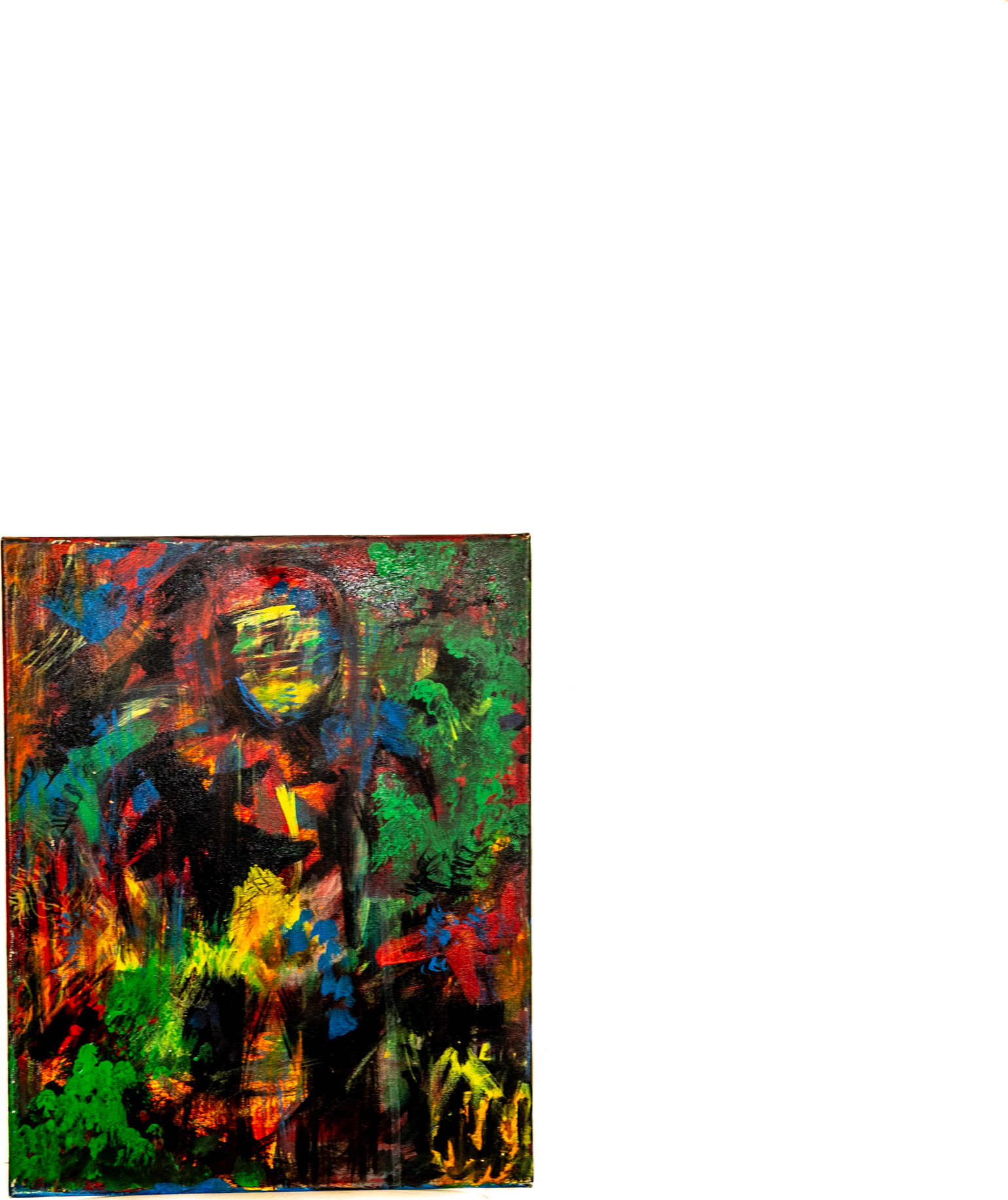 Shadowy figure with a glowing face amid dark, vivid bursts of color