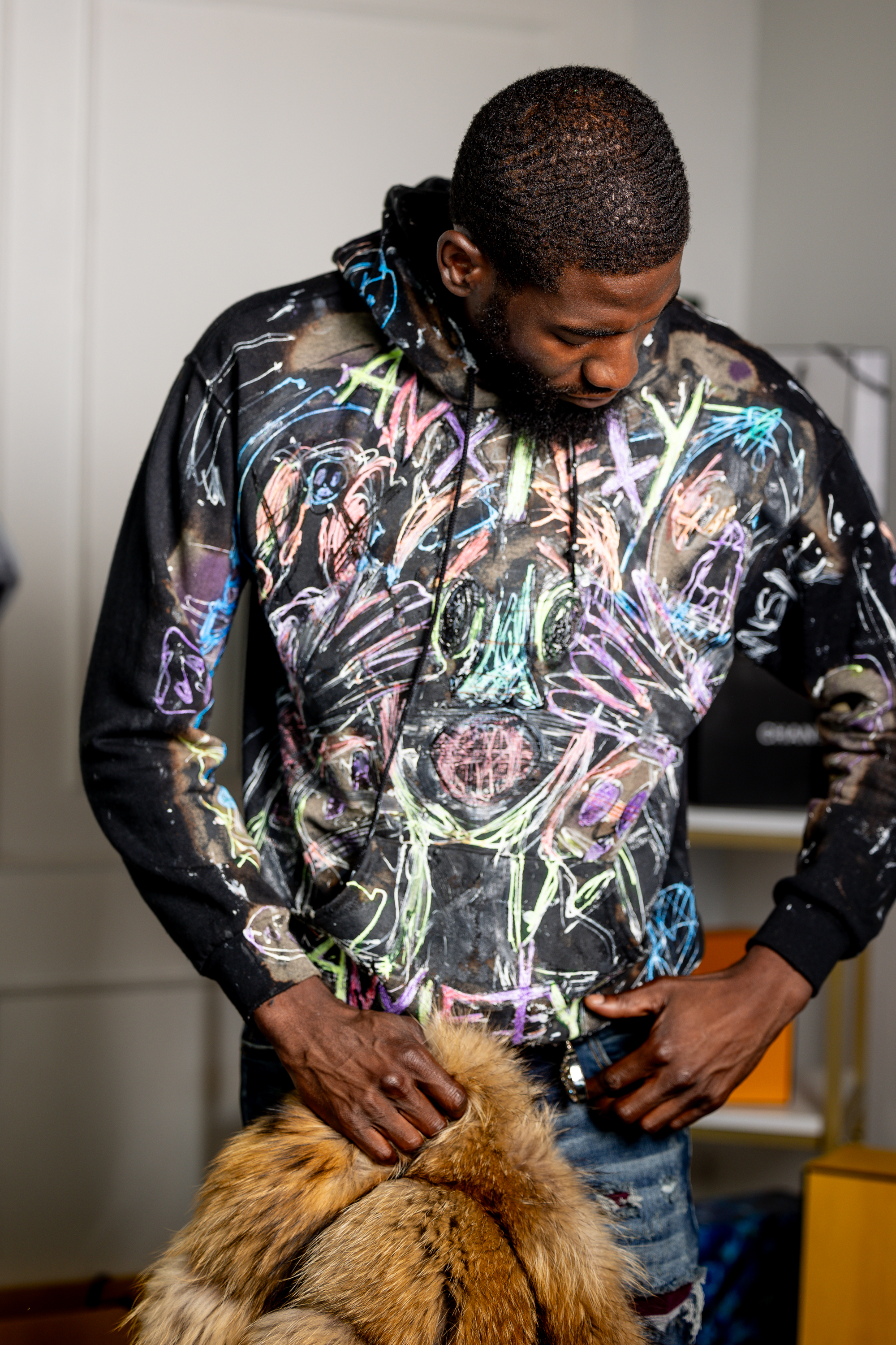 Model on the runway in hand-painted artwork clothing