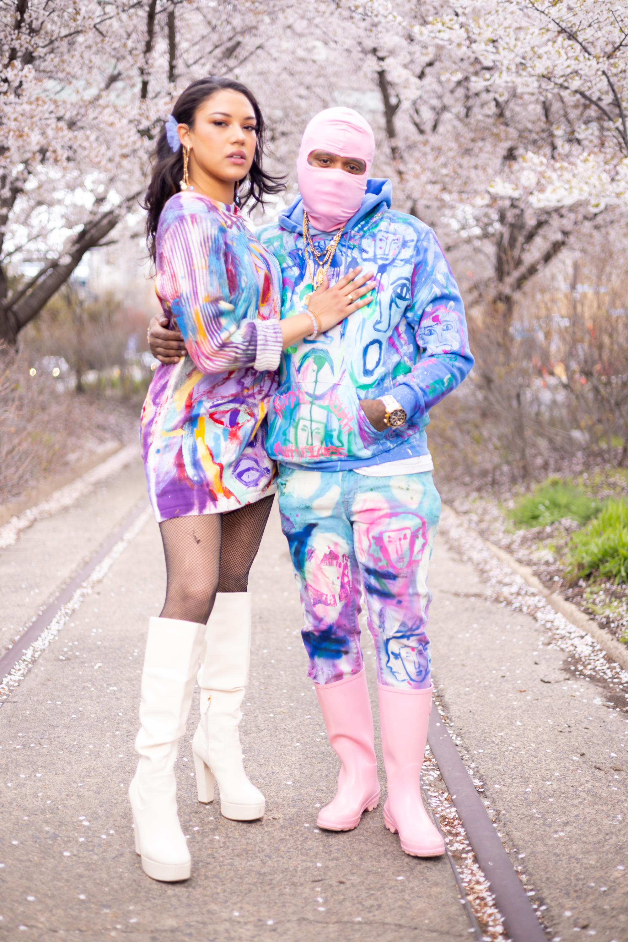 Model in vibrant hand-painted DiSoRdInE apparel by the Philadelphia riverfront
