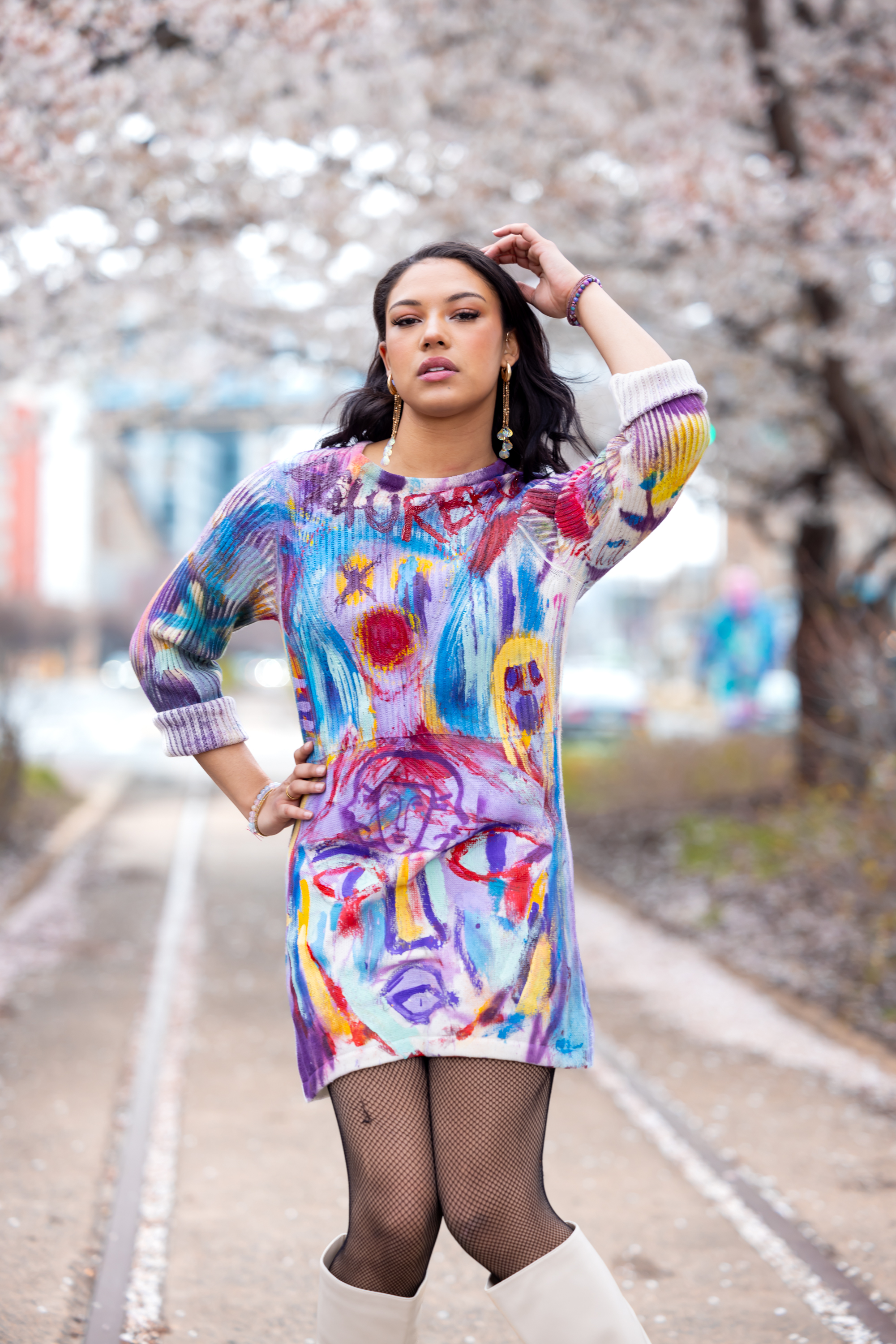 Model posing in a hand-painted DiSoRdInE piece at Penn’s Landing