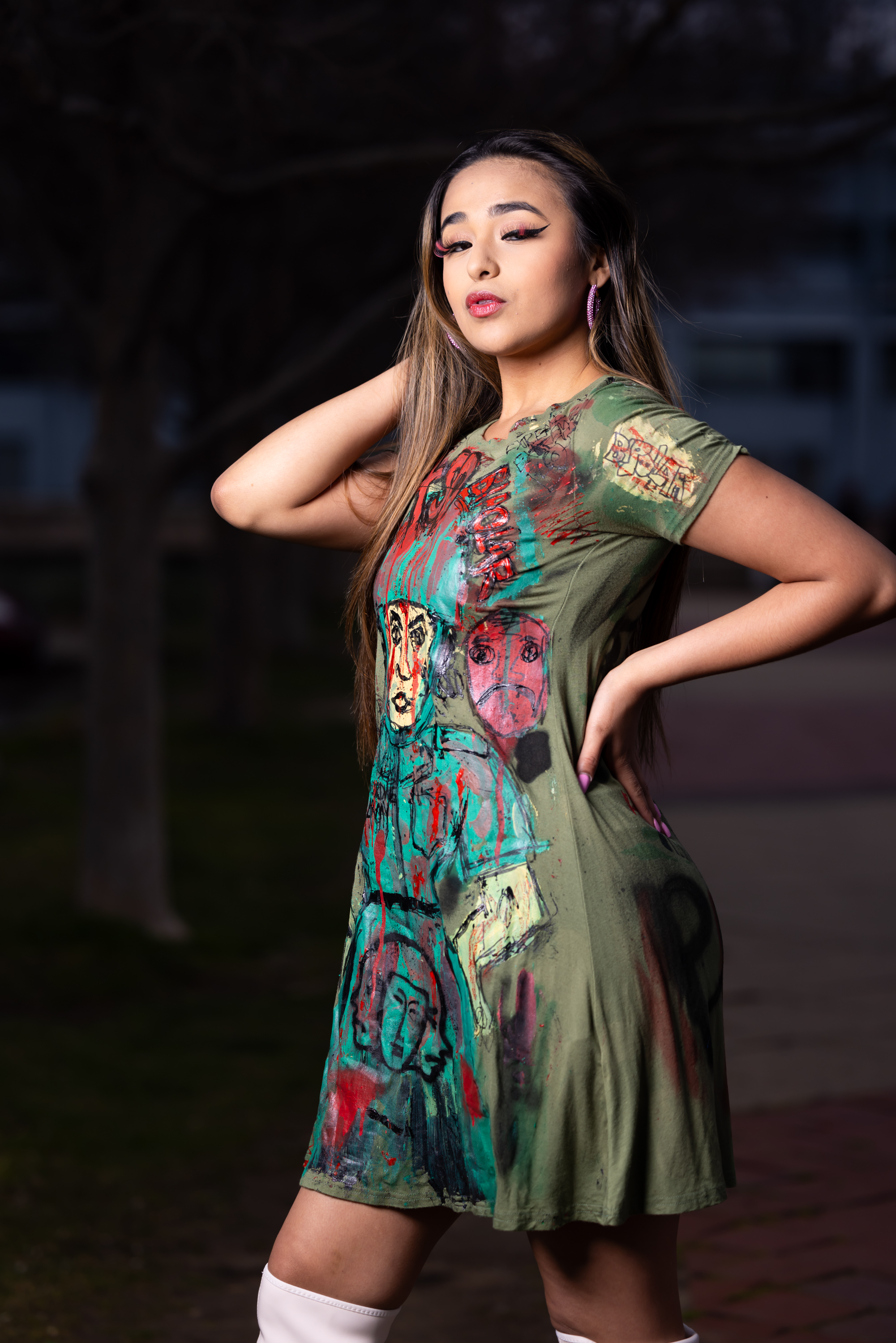 Model wearing a hand-painted DiSoRdInE piece at the Philadelphia riverfront